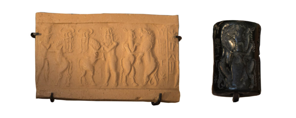 Akkadian period cylinder seal displaying a contest scene