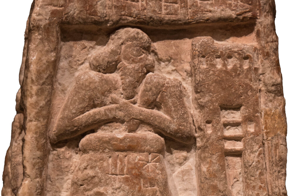 Stele of Ushumgal showing Ushumgal holding a cornet before the gate of the City
