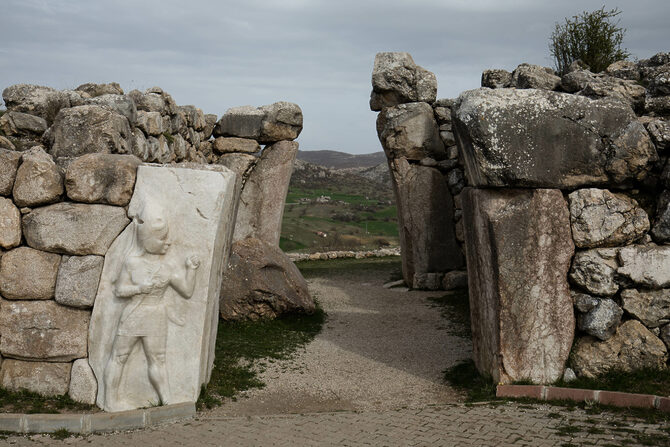 king or deity flanking gate of Hattusa