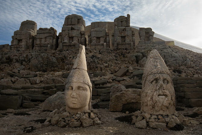 Sculpted heads of Apollo-Mithras and Artagnes-Hercules-Ares.