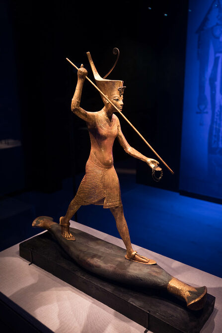 Statue of Tutankhamen spearing a hippopoatmus
