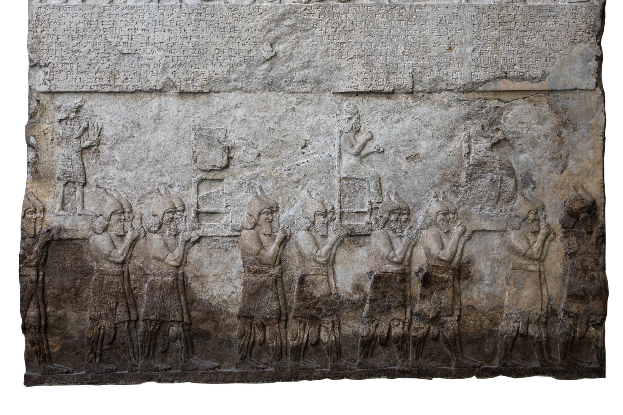 Assyrian relief from palace of Tiglath Pileser III showing Assyrians carrying away satues of the gods