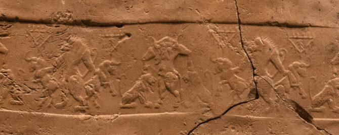 Cylinder Seal showing hybrid lioness and bull in heroic poses below proto-elamite inscription