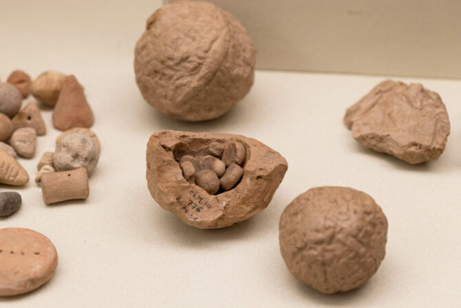 Broken Clay Bullae showing the tokens contained inside